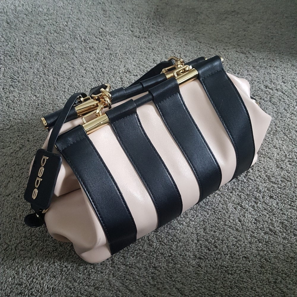 Bebe pink and black bag with gold hardware